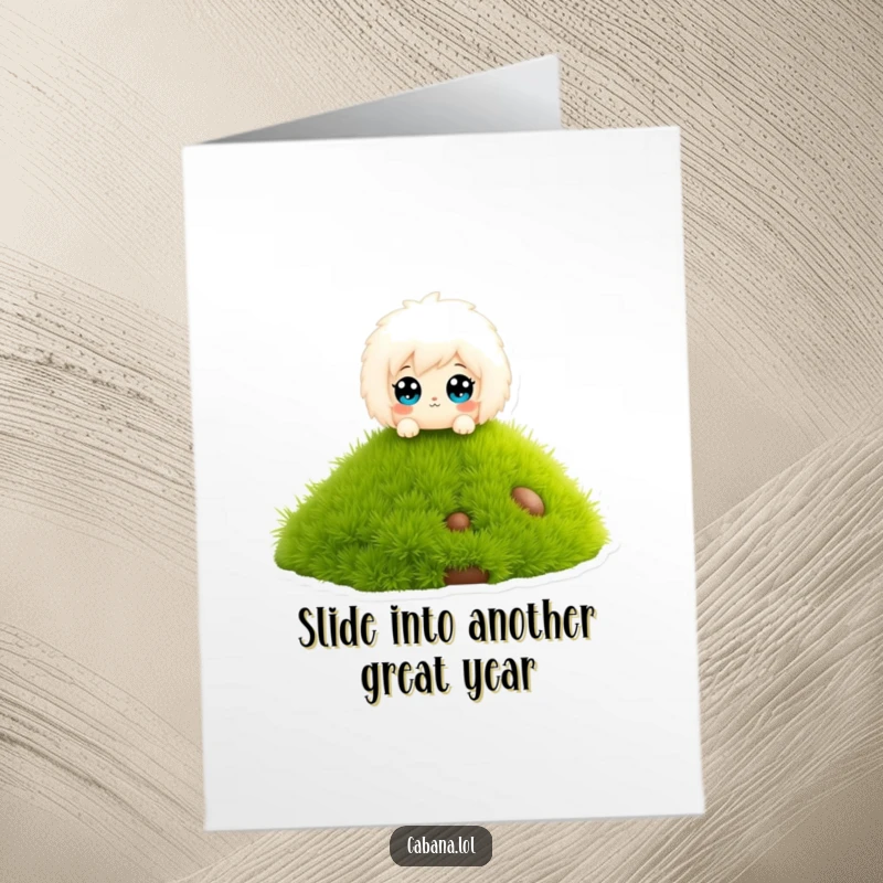 Funny Free Printable Birthday Card: a fluffy character with wide eyes, joyfully sliding down a miniature grass-covered slide with glee.